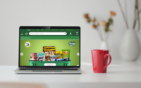 Laptop on table showing Woolworths online shopping on-screen. Original photo by bongkarn thanyakij from Pexels